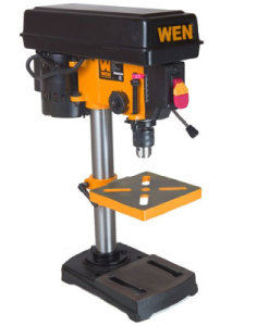 Bench drill press for making holes in glass